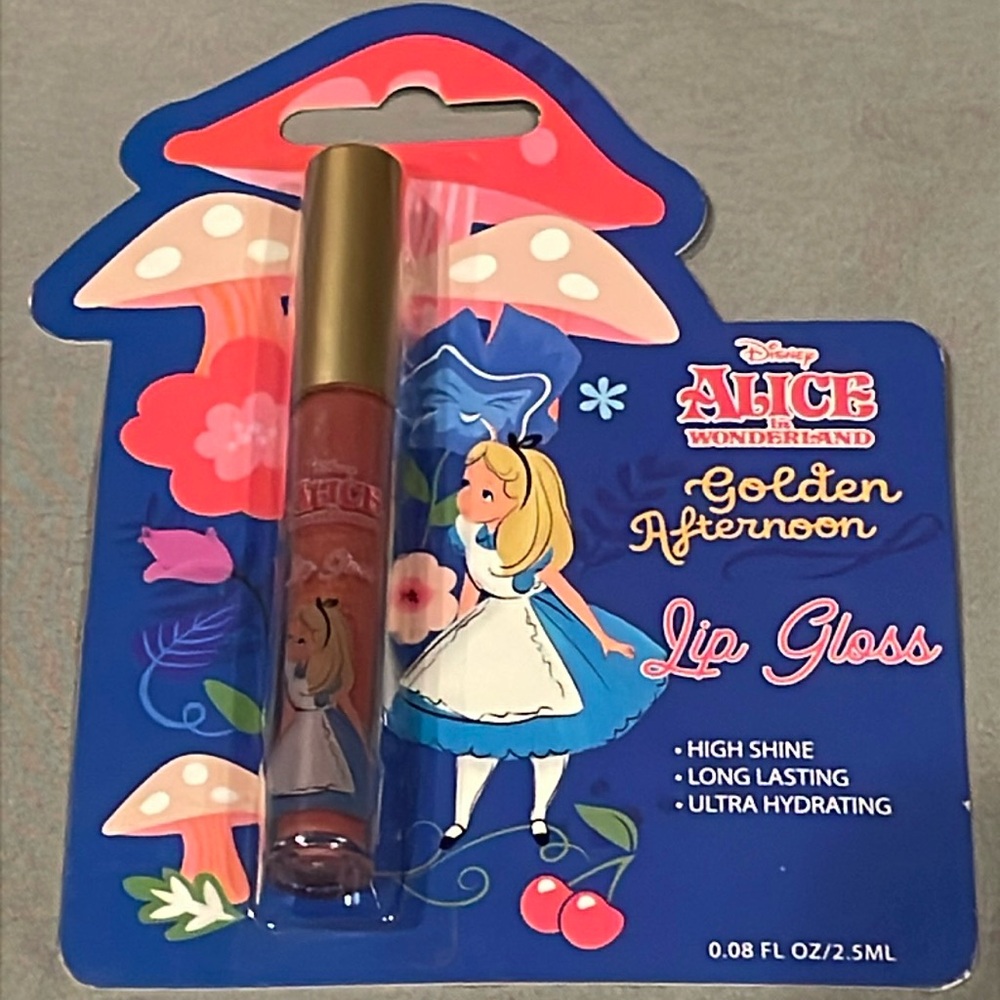 NWT Disney’s Alice in Wonderland Golden Afternoon Lip Gloss!